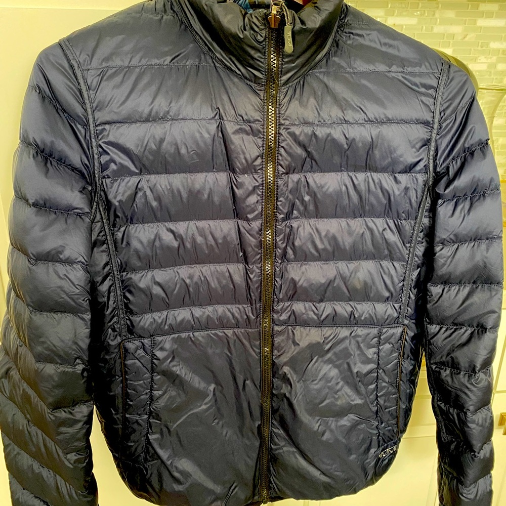 Reversible light down puffer jacket (navy blue and camouflage blue tones.